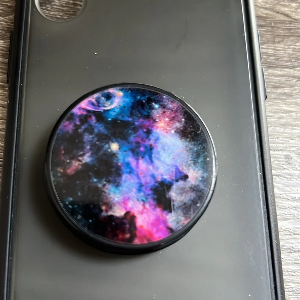 iPhone X case with a galaxy pattern holder